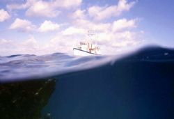 'UH-OH!' Ship headed for the reef - blue hole, Honduras. ... by Rick Tegeler 